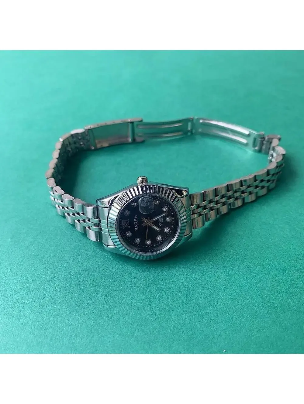 Classy Y2K 2000s style Silver and black watch with diamond accents. Nice quality